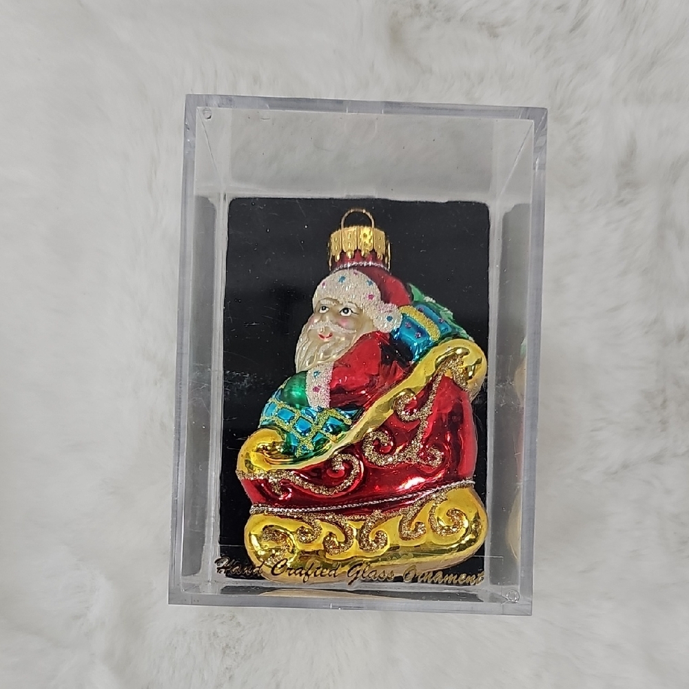 Santa's Workbench Hand Crafted Blown Glass Santa Ornament in Red and Gold